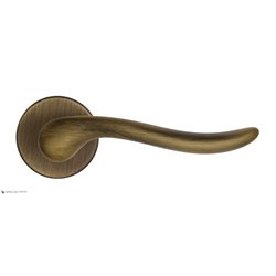 Дверная ручка на круглом основании Fratelli Cattini "MAYA" 7-BY матовая бронза